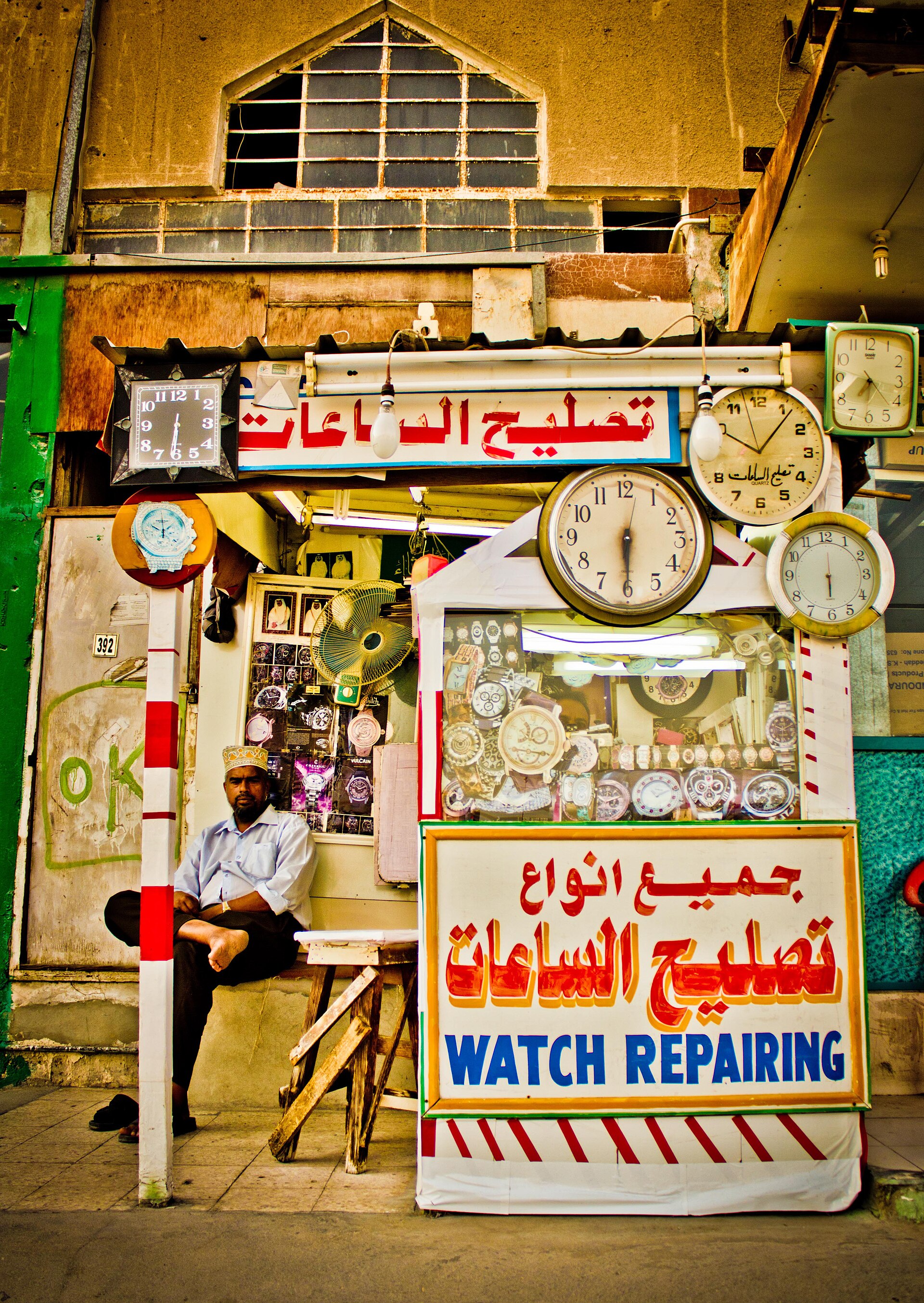A watch repairer working on a mechanical watch movement